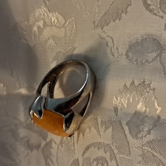 Slightly oval stone, silver band which cleaned up beautifully. - Picture 2 of 3